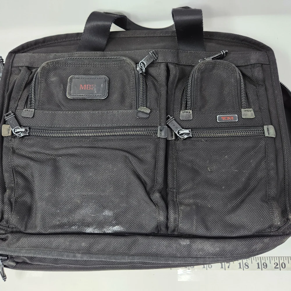 TUMI Black Briefcase with Durable Design